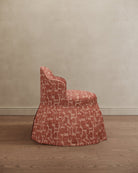 Sona Princess Vanity Stool Patterned Brick Red - Marble Lotus - Red patterned chair against a beige wall