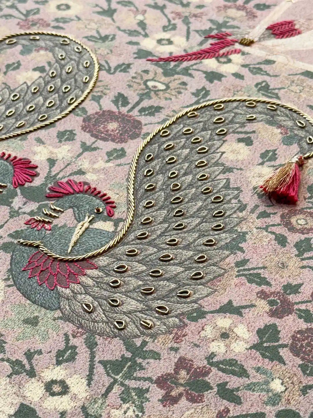 Kashmiriyat, Embroidered Wallart - Marble Lotus - High-detail shot of a majestic peacock motif with gold metallic cording and three-dimensional bead accents
