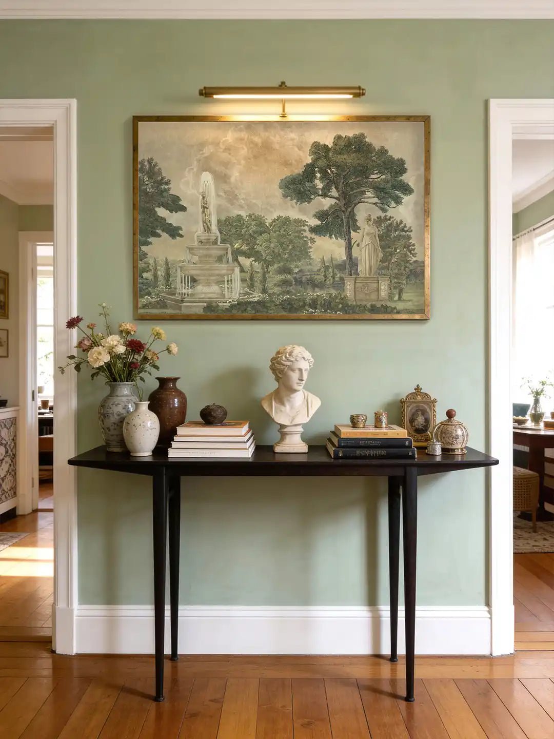 Vintage European Landscape Wallart - Marble Lotus - Neoclassical garden wall art displayed above a dark wood console table with a bust and fresh flowers in a sage green foyer.